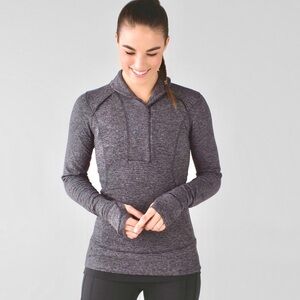 Lululemon Think Fast half-zip pullover in heathered herringbone black.